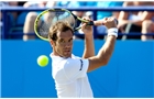 EASTBOURNE, ENGLAND - JUNE 21:  Richard Gasquet of France in action a point during the Men's Final between Richard Gasquet of France and Feliciano Lopez of Spain at the Aegon International at Devonshire Park on June 21, 2014 in Eastbourne, England.  (Photo by Ben Hoskins/Getty Images)